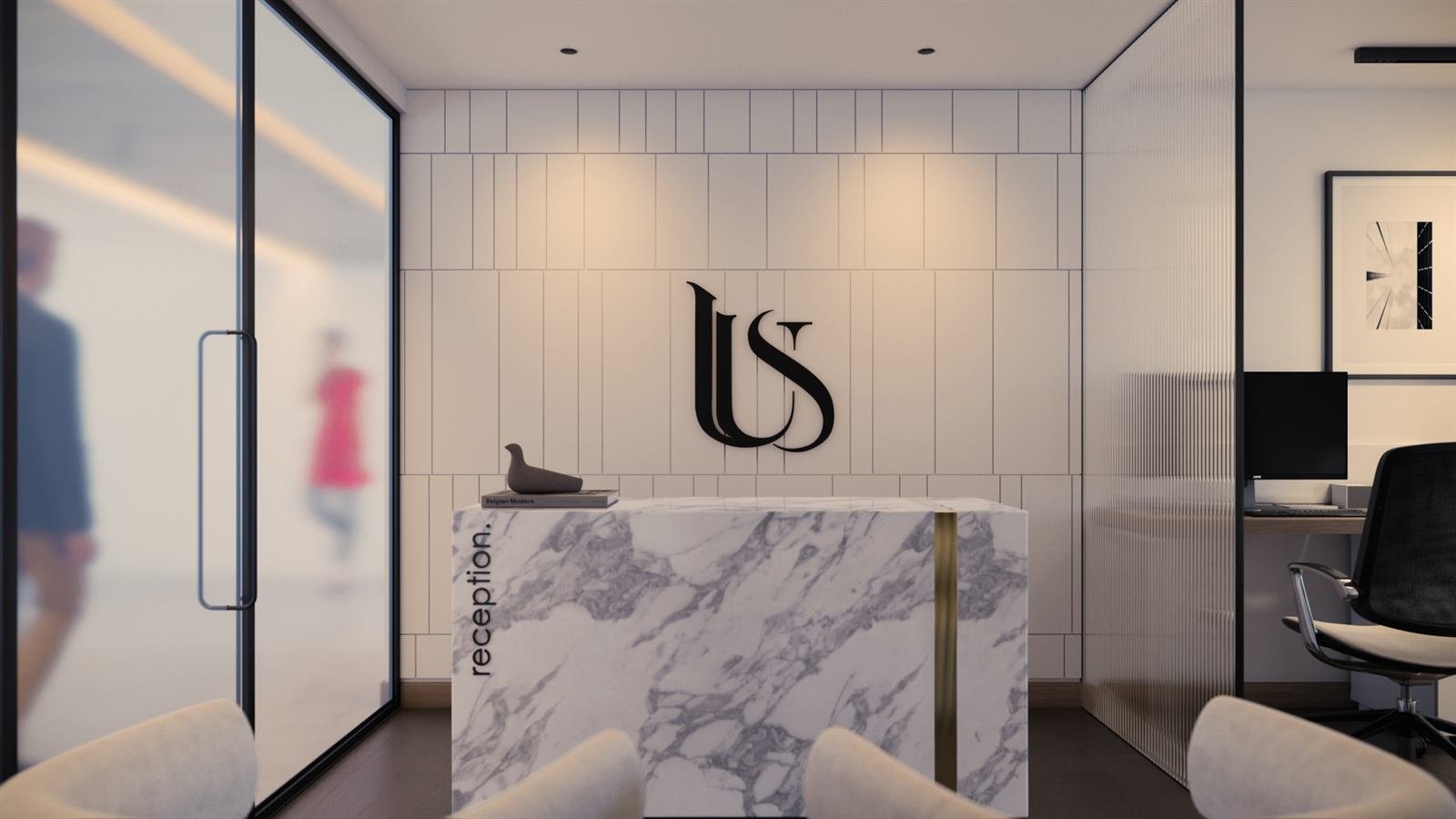Urban Shivashish office reception with marble desk and US monogram