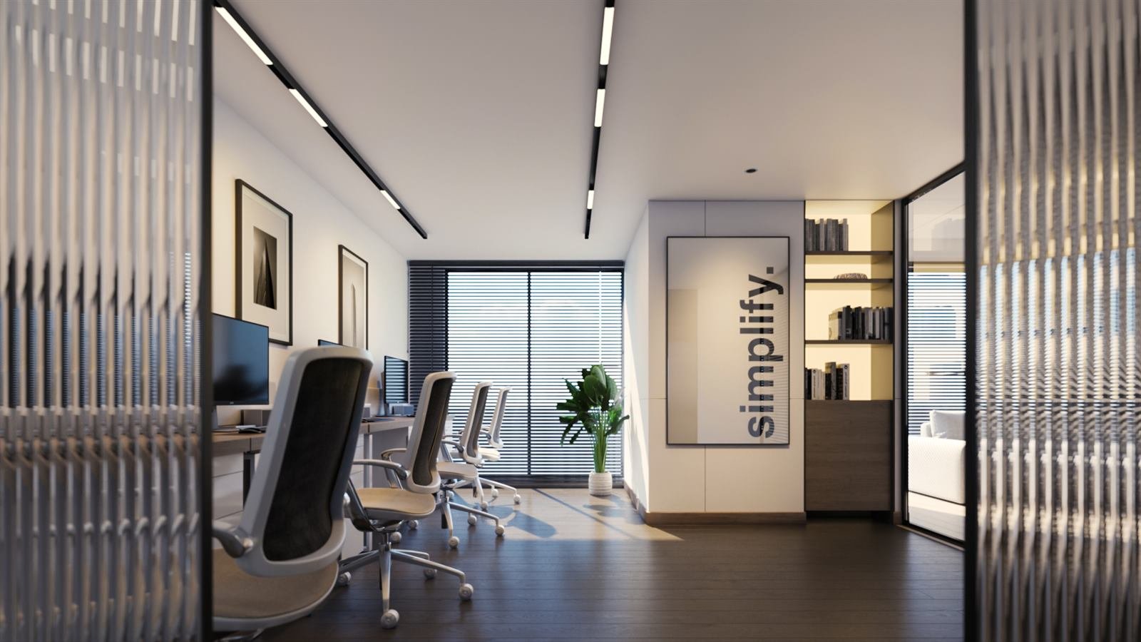 Open workspace with desks, storage and full-height glazing
